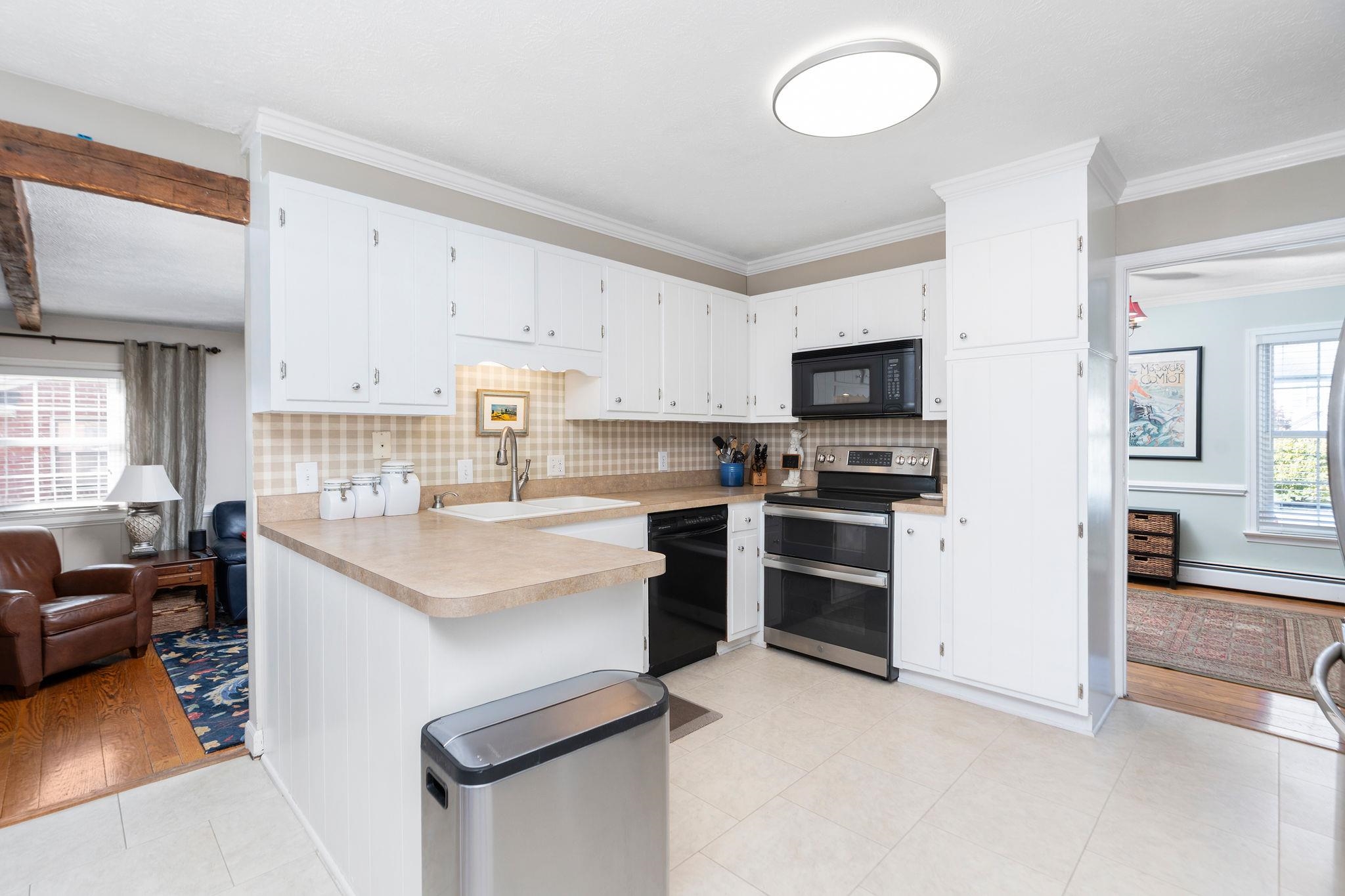 112 Country Lodge Road Waynesboro, VA 22980 - Photo 8 of 74 a kitchen with a stove a sink and a refrigerator