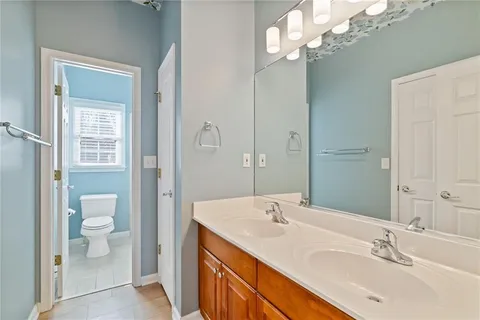 a white bath tub sitting next to a window