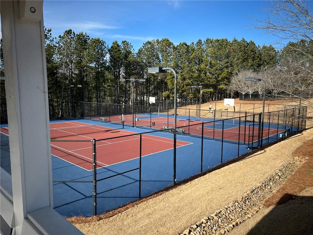 544 Ridge View Crossing Woodstock, GA 30188 - Photo 38 of 41 a view of a tennis court with wooden fence