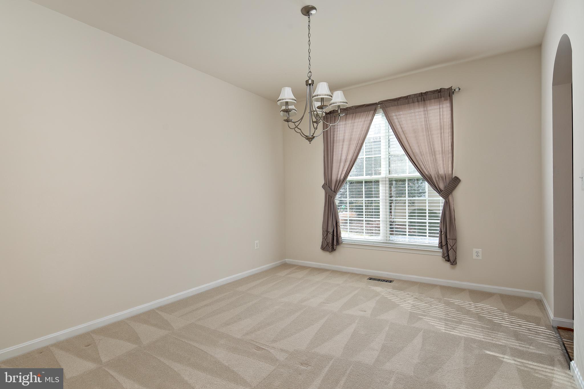 450 Blossom Tree Road Culpeper, VA 22701 - Photo 11 of 32 Formal Dining Room connects to kitchen.