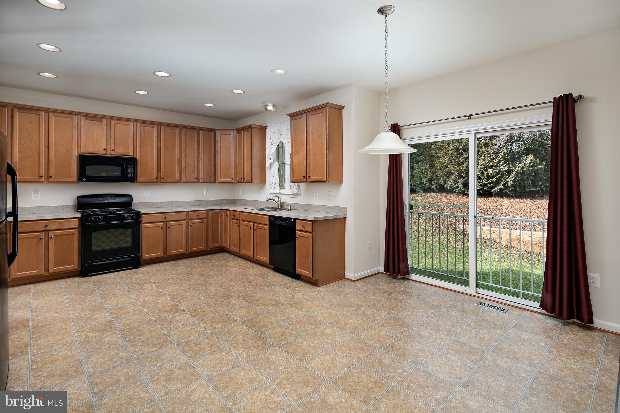 450 Blossom Tree Road Culpeper, VA 22701 - Photo 9 of 32 Spacious eat in kitchen .