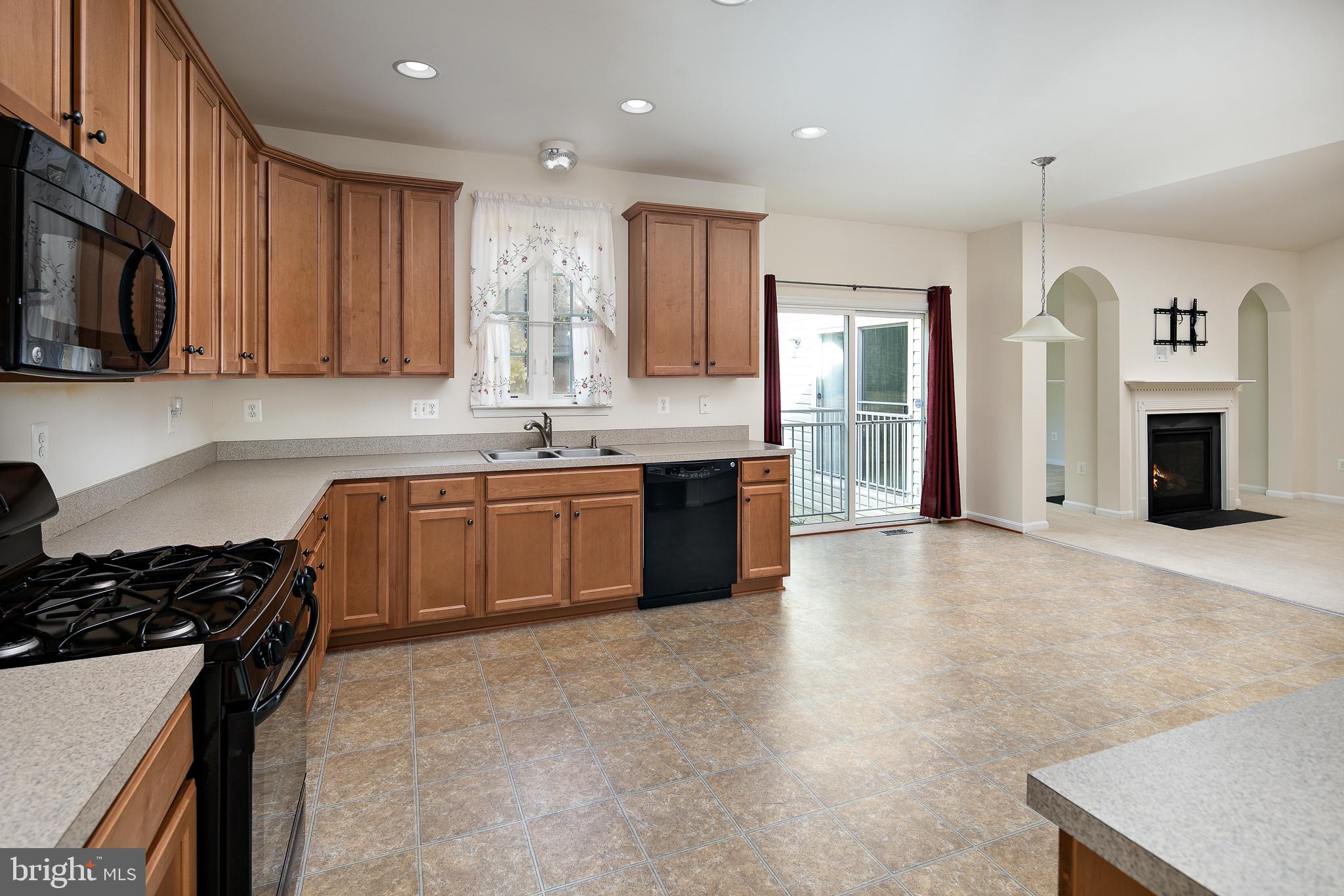 450 Blossom Tree Road Culpeper, VA 22701 - Photo 10 of 32 Glass doors for natural light and open to LR.