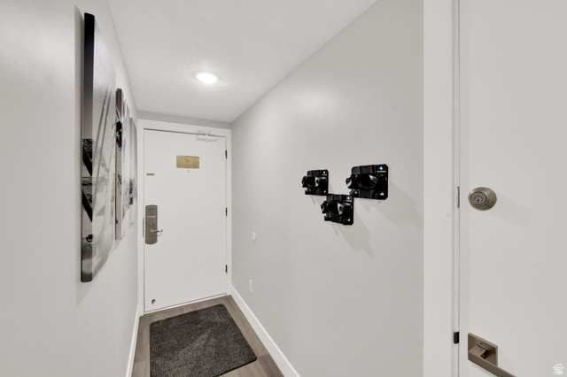 50 Shadow Ridge Road, Unit 4209 Park City, UT 84060 - Photo 14 of 50 Recessed ceiling lighting, wood-finish flooring, white doors, and painted walls