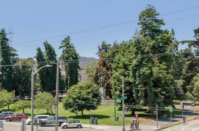 a view of a bench in a garden