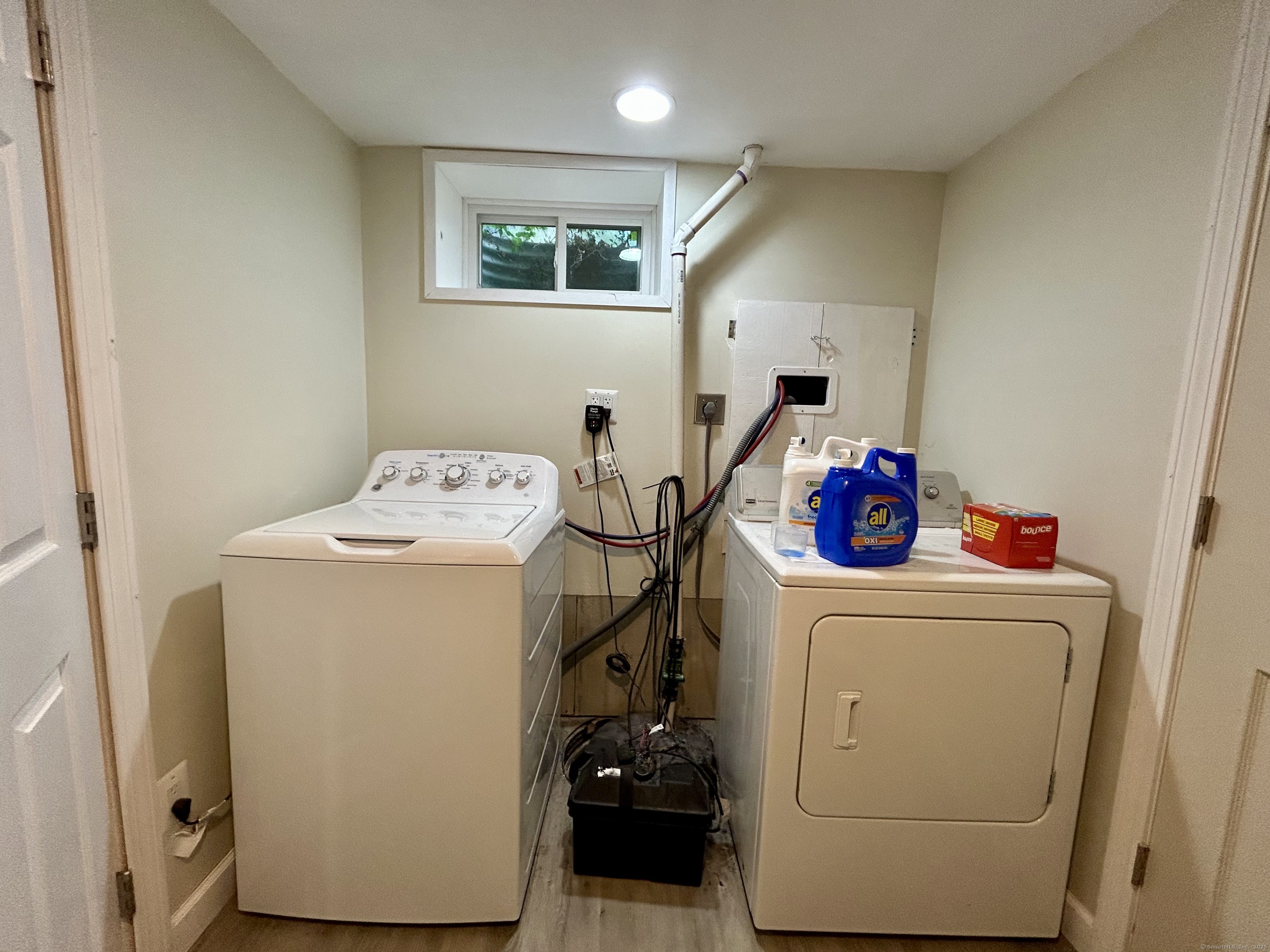 30 Apter Drive Torrington, CT 06790 - Photo 26 of 36 a utility room with dryer and washer