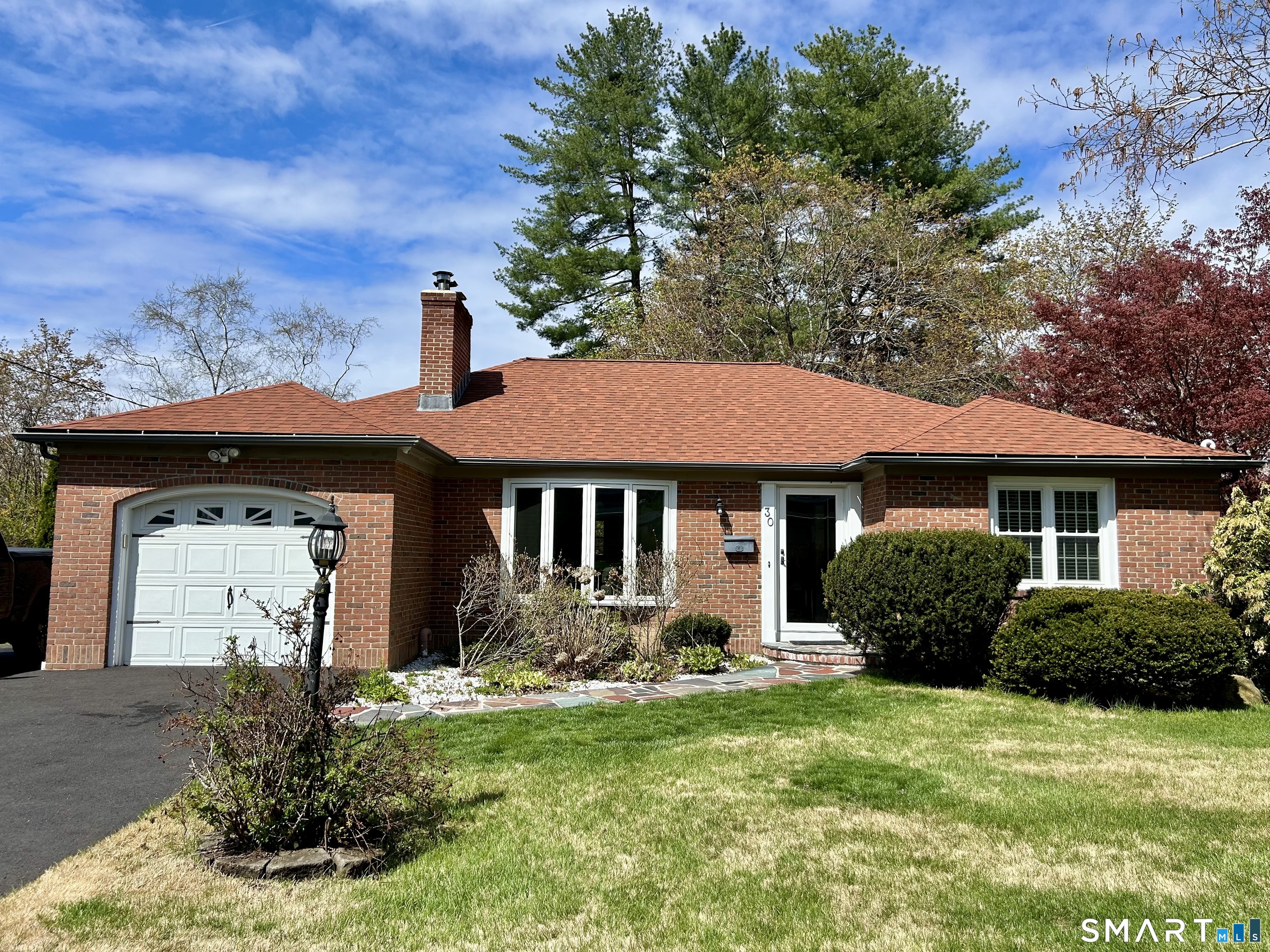 30 Apter Drive Torrington, CT 06790 - Photo 27 of 36 a front view of a house with garden