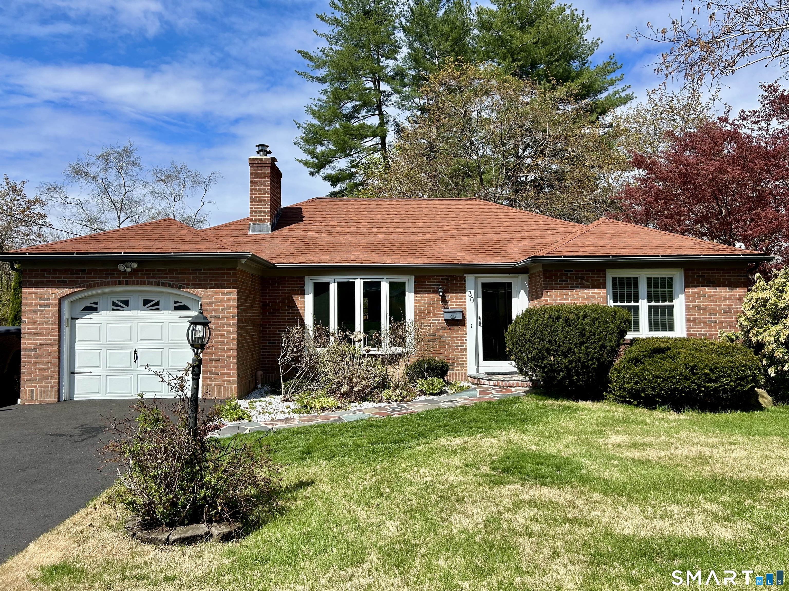 30 Apter Drive Torrington, CT 06790 - Photo 28 of 36 a front view of a house with garden