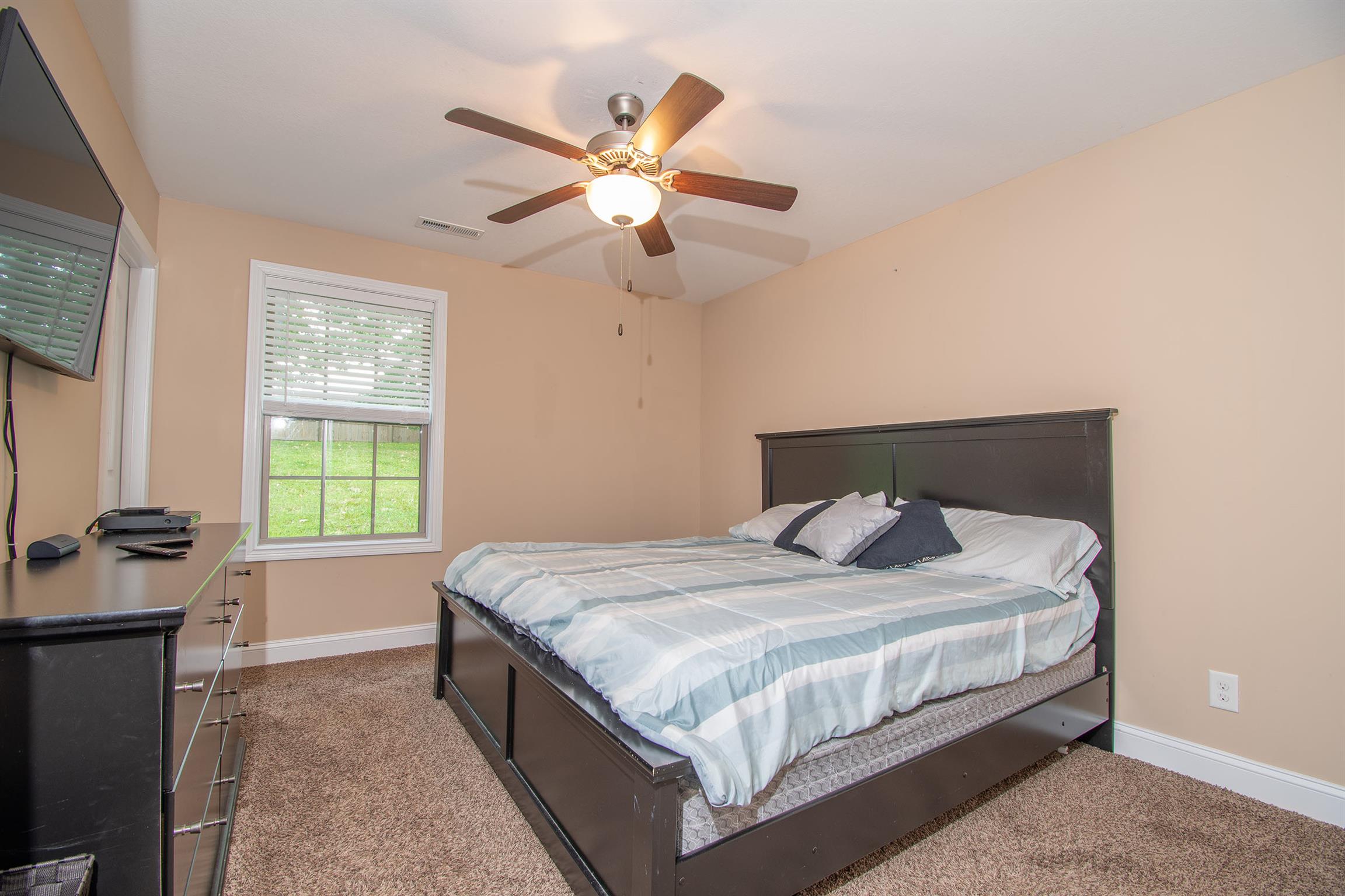 737 Inver Lane Clarksville, TN 37042 - Photo 11 of 17 a bedroom with a bed and window