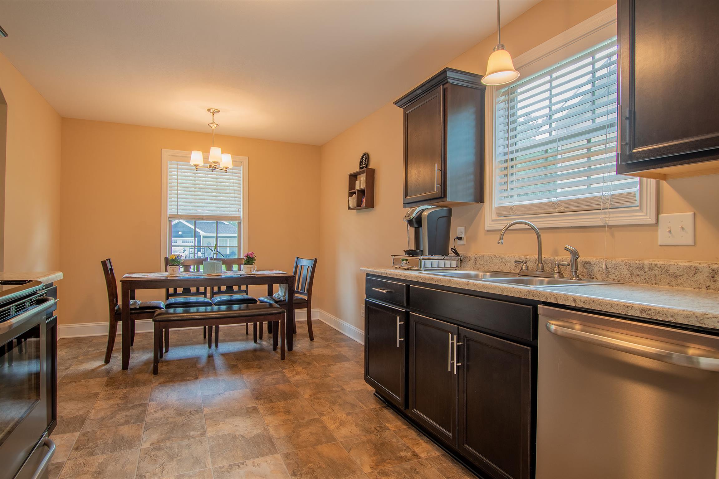737 Inver Lane Clarksville, TN 37042 - Photo 5 of 17 a kitchen with a sink cabinets and window