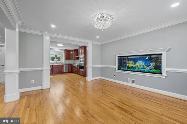 a view of kitchen with furniture and flat screen tv