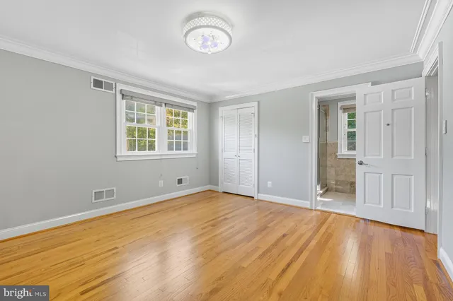 a bathroom with a shower and a toilet