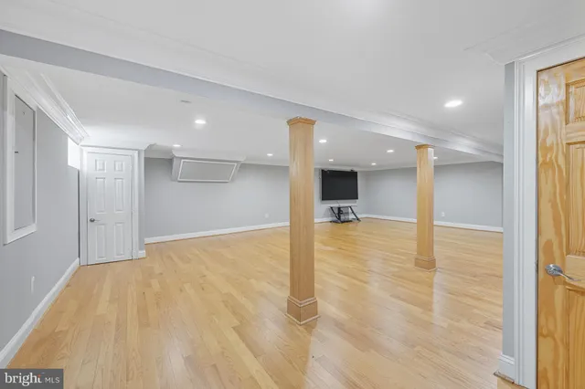 a bathroom with a granite countertop toilet a sink and bathtub