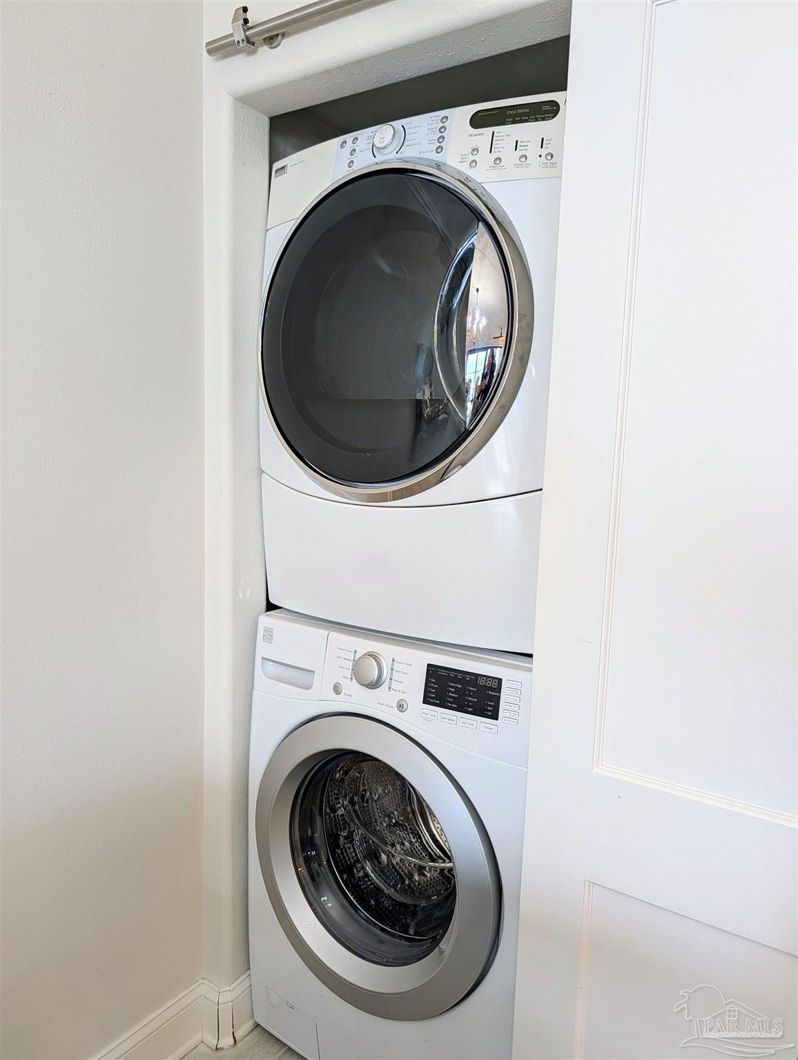 14623 Perdido Key Drive, Unit 401 Perdido Key, FL 32507 - Photo 29 of 40 a utility room with dryer and washer