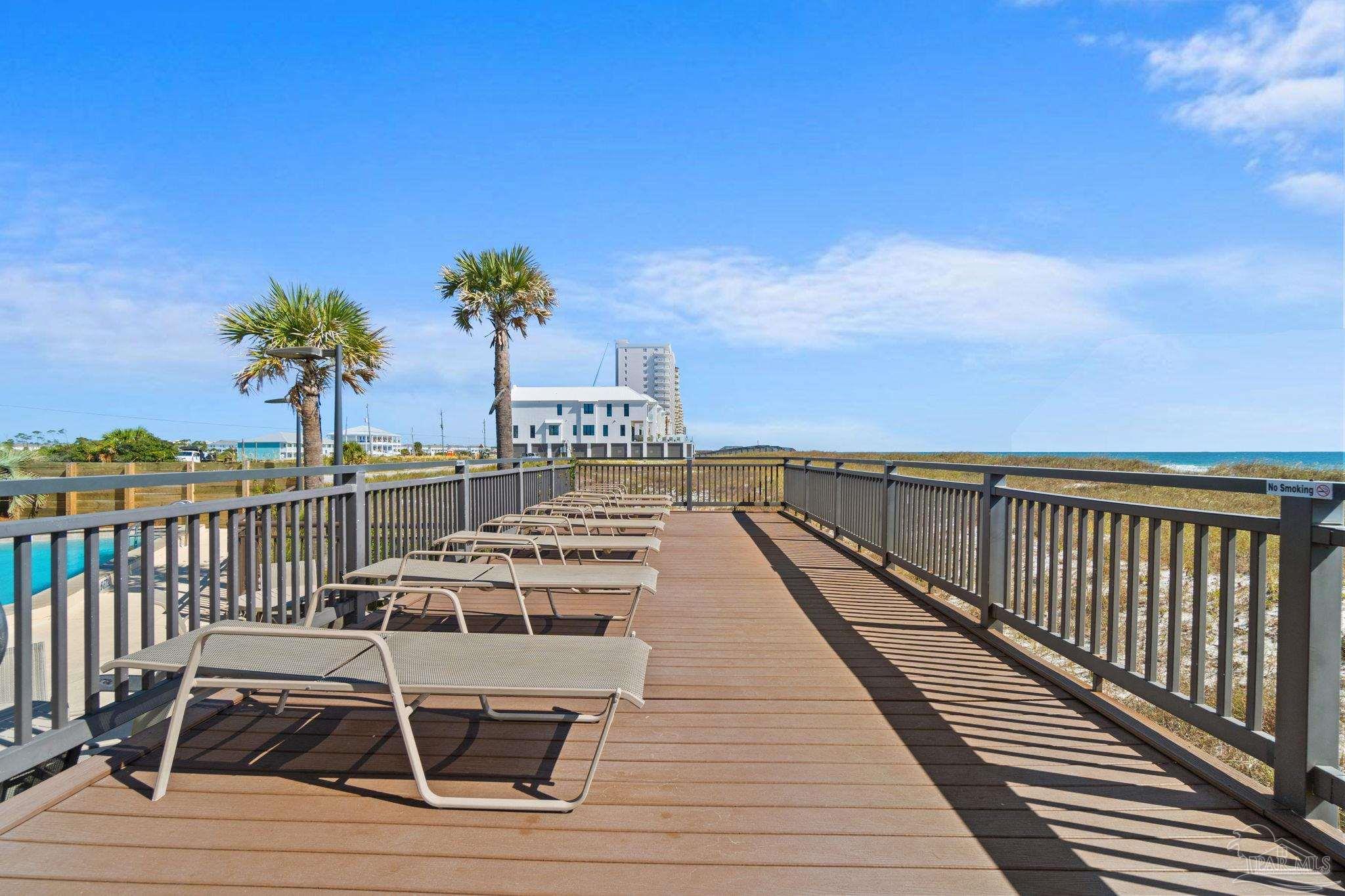14623 Perdido Key Drive, Unit 401 Perdido Key, FL 32507 - Photo 33 of 40 a view of a balcony with chairs