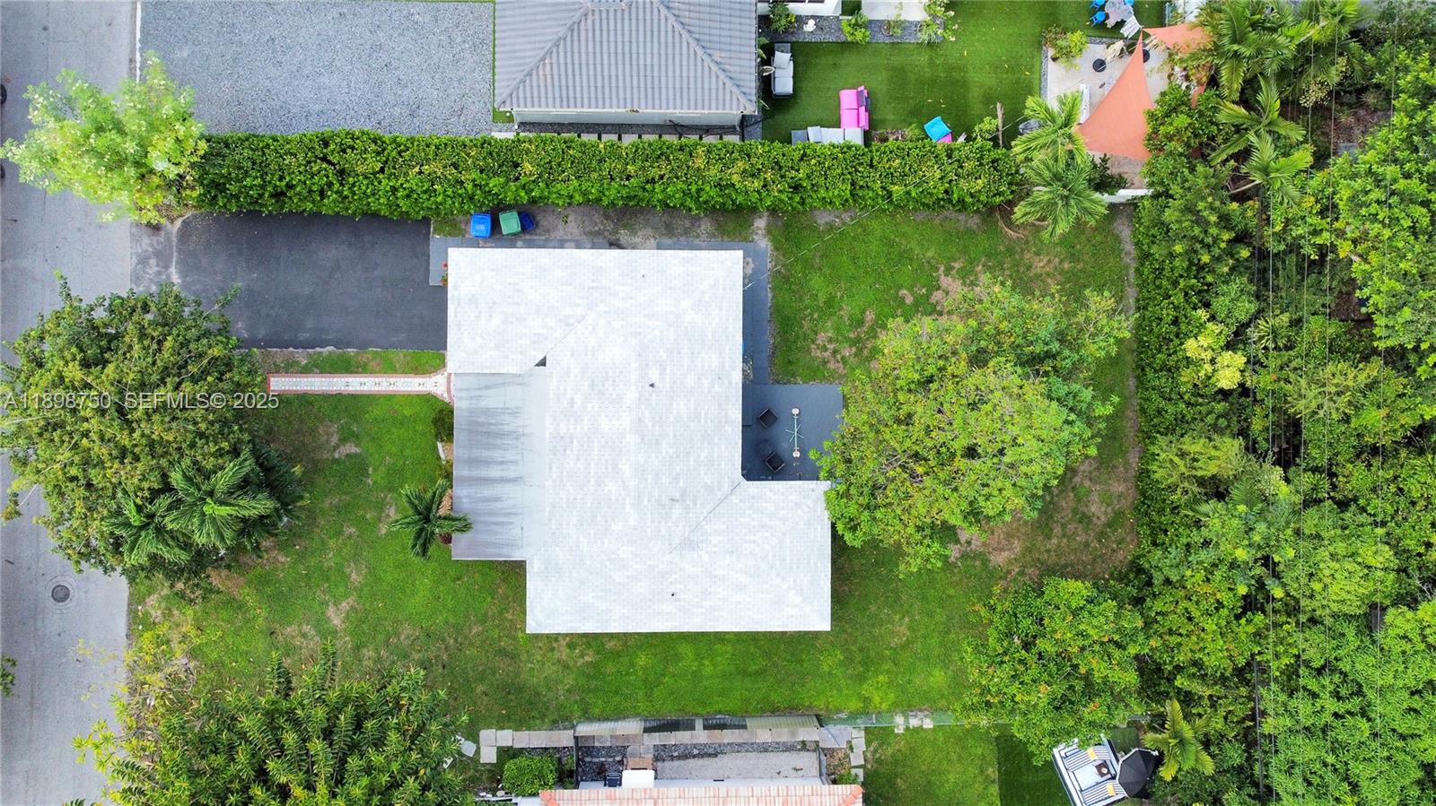 231 Northeast 43rd Street Miami, FL 33137 - Photo 35 of 35 an aerial view of a house with a yard and garden