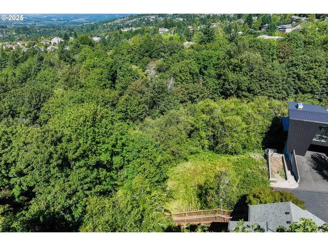 a view of a yard with an outdoor seating