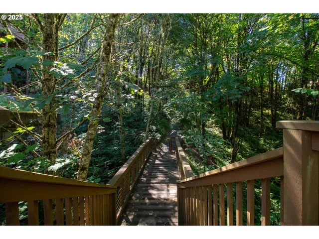 a view of a wooden fence