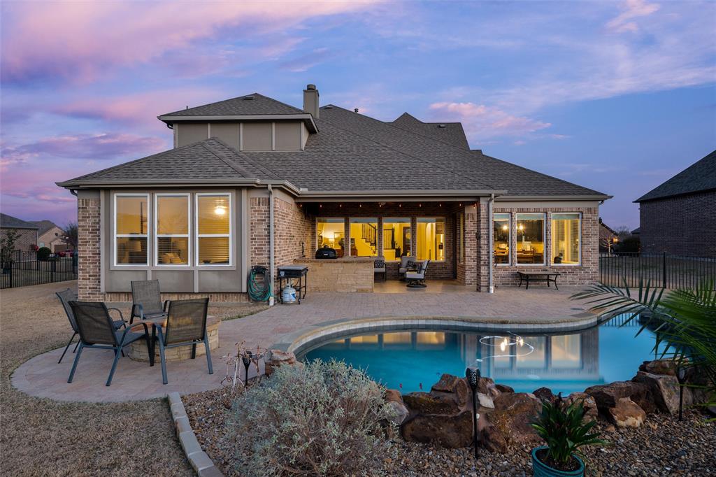 1505 Wolf Ridge Run Gunter, TX 75058 - Photo 2 of 40 Saltwater pool, tanning ledge and firepit for resort living