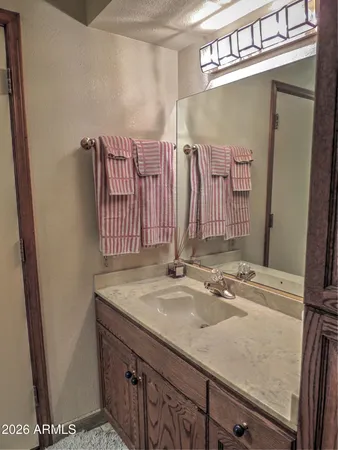 a bathroom with a tub and a shower