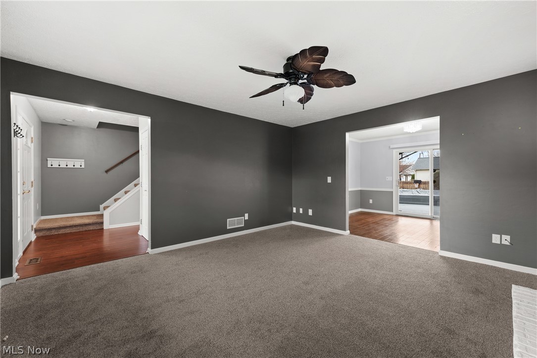 33990 Harding Avenue North Ridgeville, OH 44039 - Photo 6 of 37 Living room with view of foyer and dining room