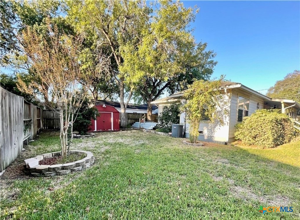 2001 East Forrest Street Victoria, TX 77901 - Photo 16 of 16 a view of a garden with a fountain