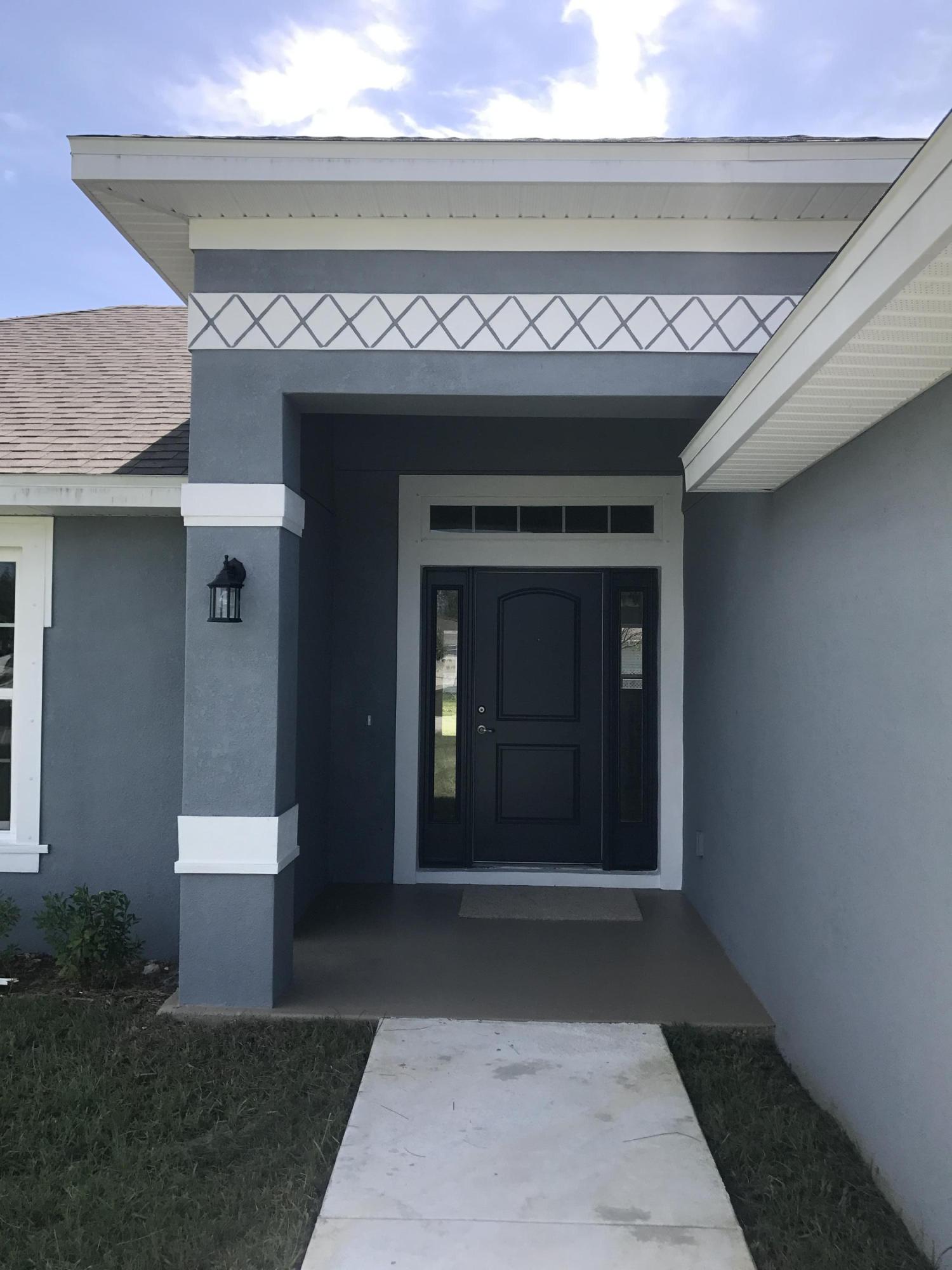 261 Southwest Covington Road Port St. Lucie, FL 34953 - Photo 6 of 42 Photo Jul 24, 3 17 19 PM