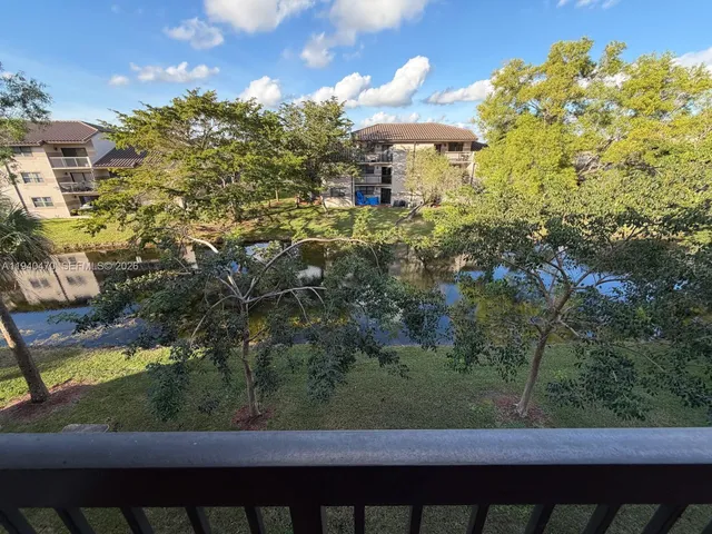 a view of a balcony with an outdoor space
