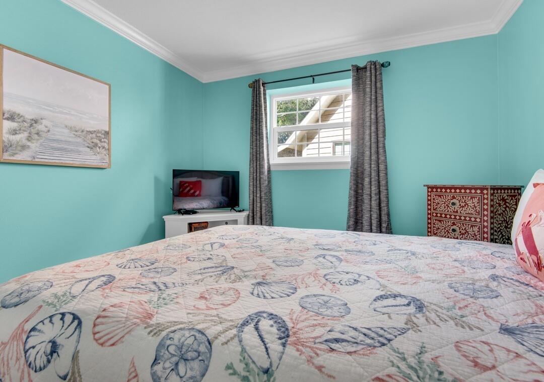 85 Breakwater Bay, Unit 10D Miramar Beach, FL 32550 - Photo 21 of 39 a bedroom with a bed and a window