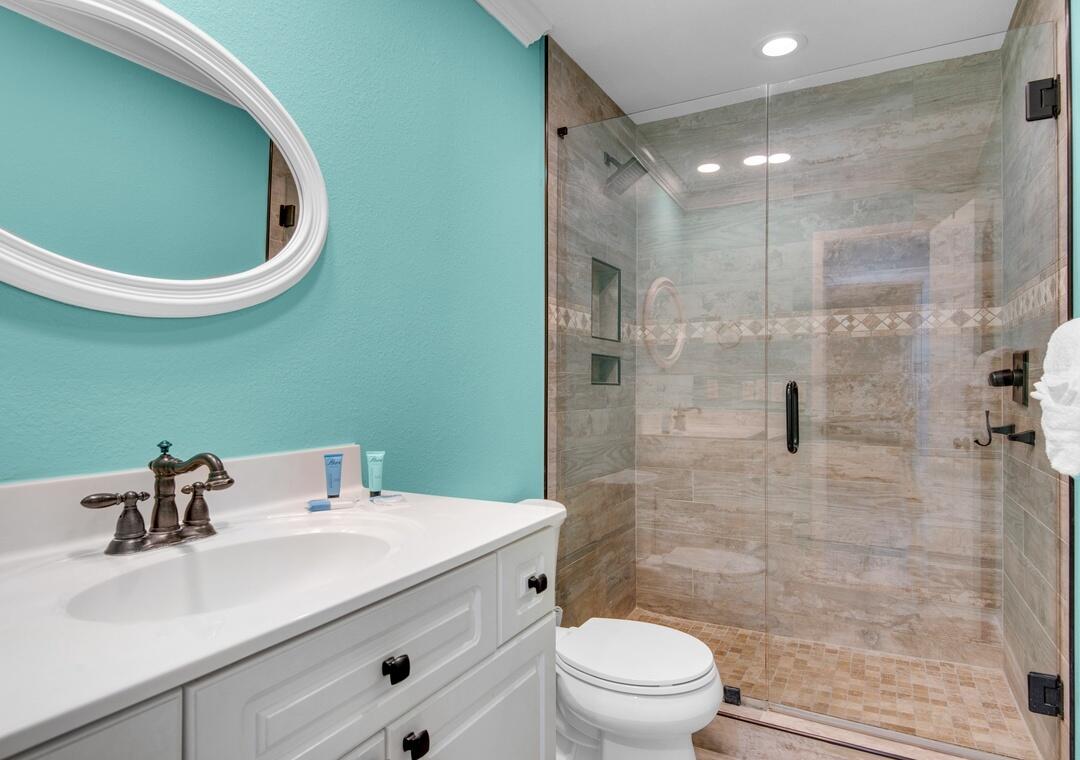 85 Breakwater Bay, Unit 10D Miramar Beach, FL 32550 - Photo 22 of 39 a bathroom with a sink and a mirror