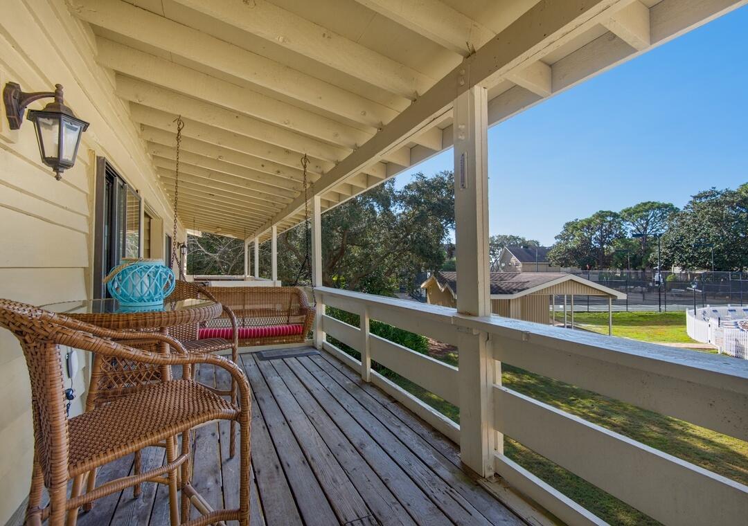 85 Breakwater Bay, Unit 10D Miramar Beach, FL 32550 - Photo 3 of 39 a view of a chairs and table in the balcony