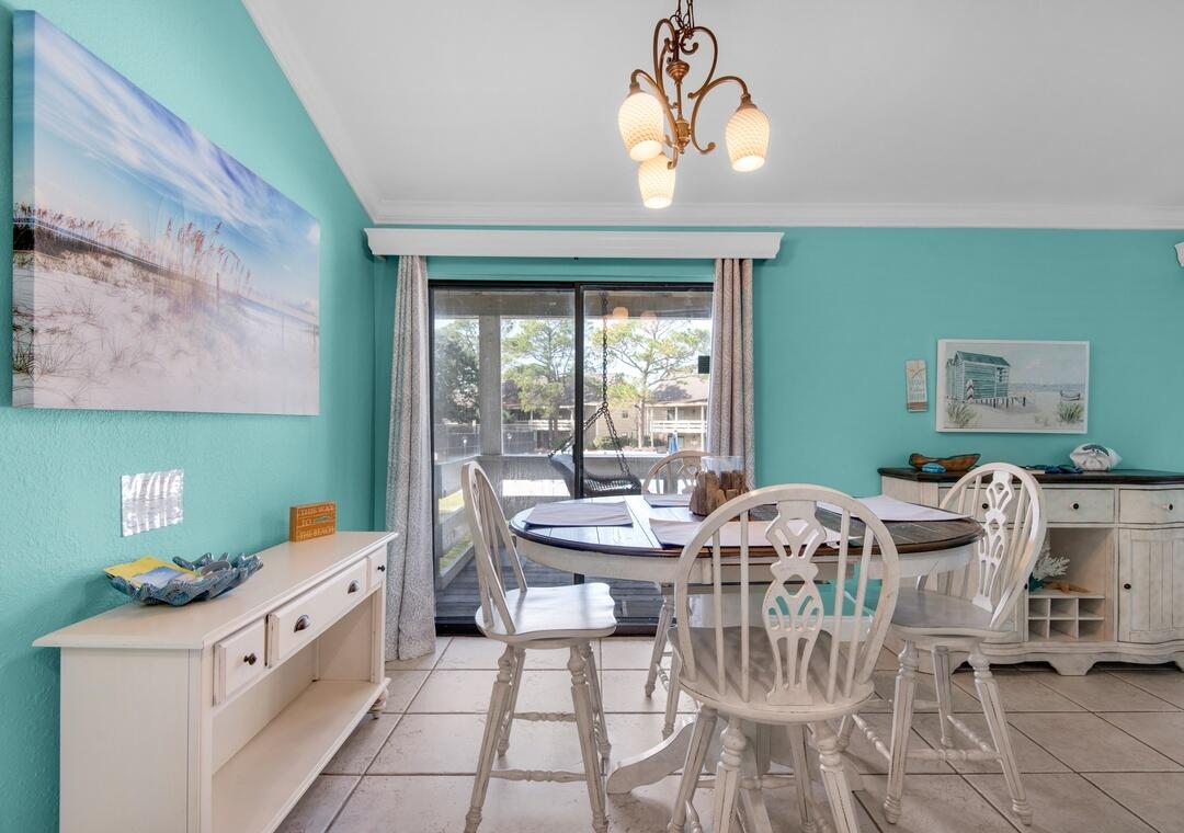 85 Breakwater Bay, Unit 10D Miramar Beach, FL 32550 - Photo 8 of 39 a very nice looking dining room with a large window