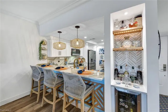 a view of a dining area with furniture window and wooden floor