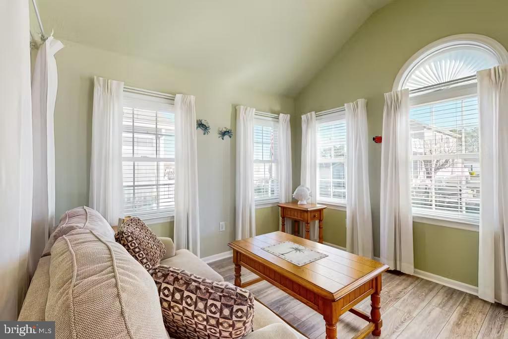 37022 Blue Teal Road Selbyville, DE 19975 - Photo 8 of 20 a bedroom with furniture and a window