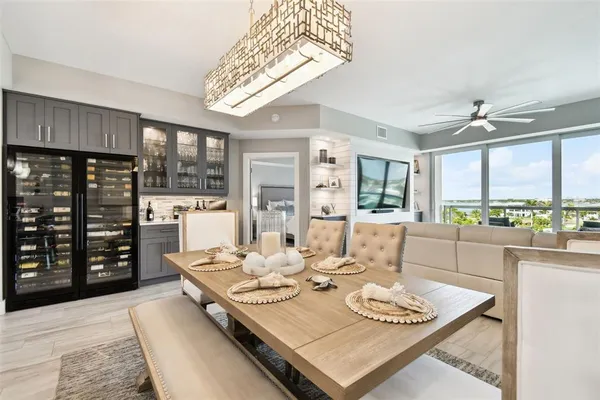 a view of a dining room with furniture window and outside view