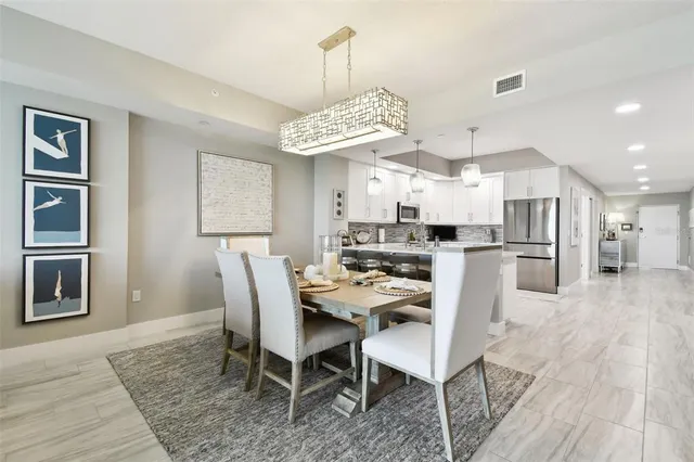 a view of a dining room with furniture