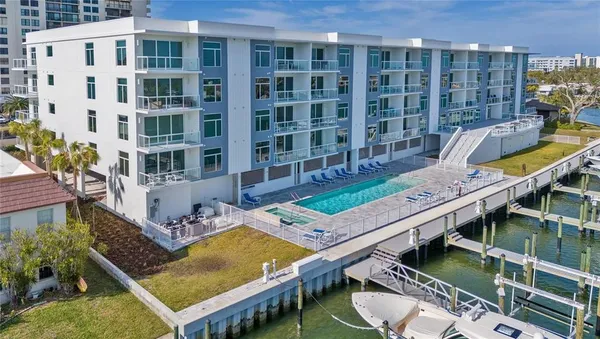 a view of a balcony with chairs