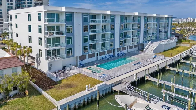 a view of a balcony with chairs