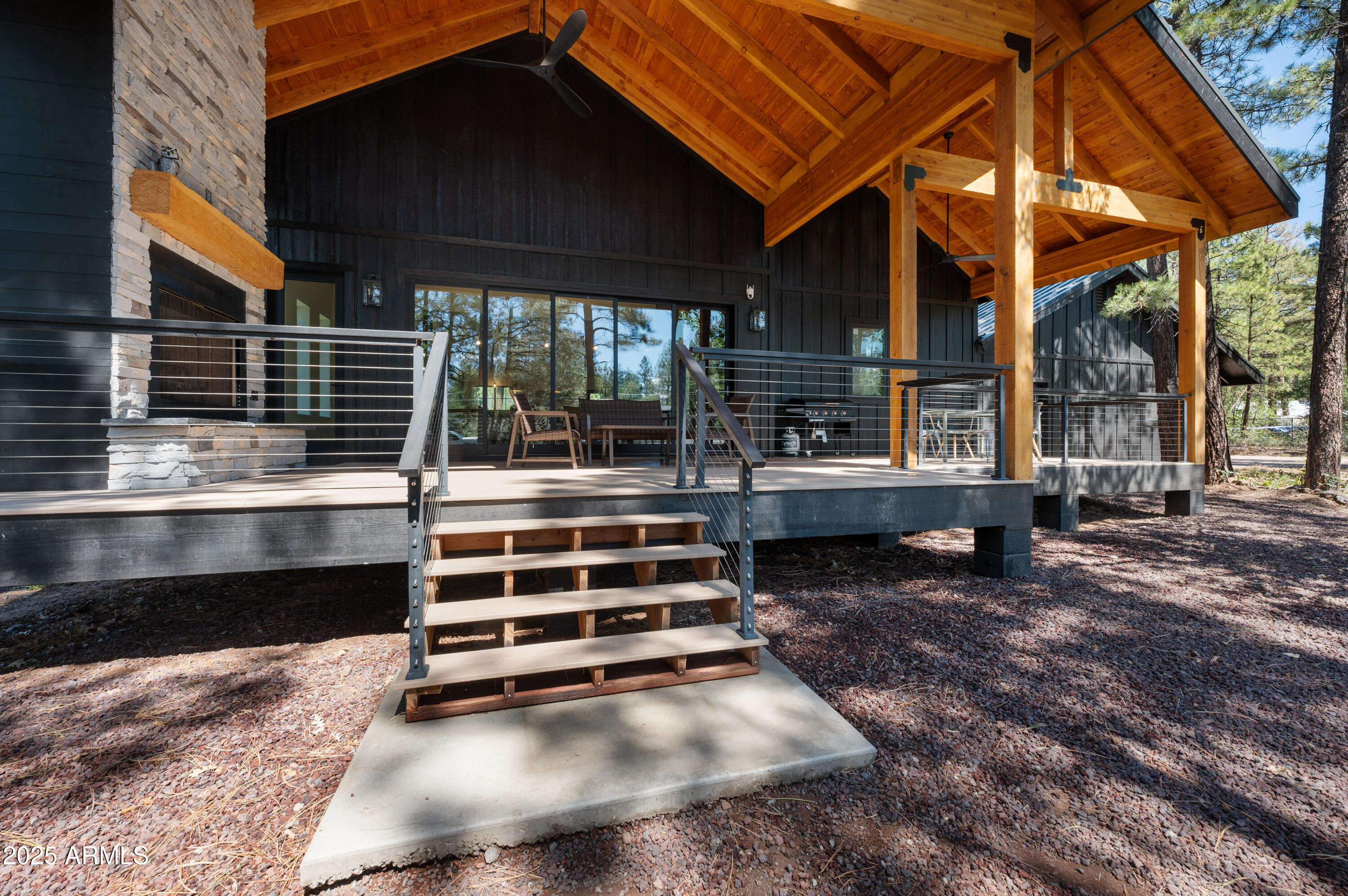 820 West Apache Lane Lakeside, AZ 85929 - Photo 11 of 40 a view of backyard with deck and wooden floor