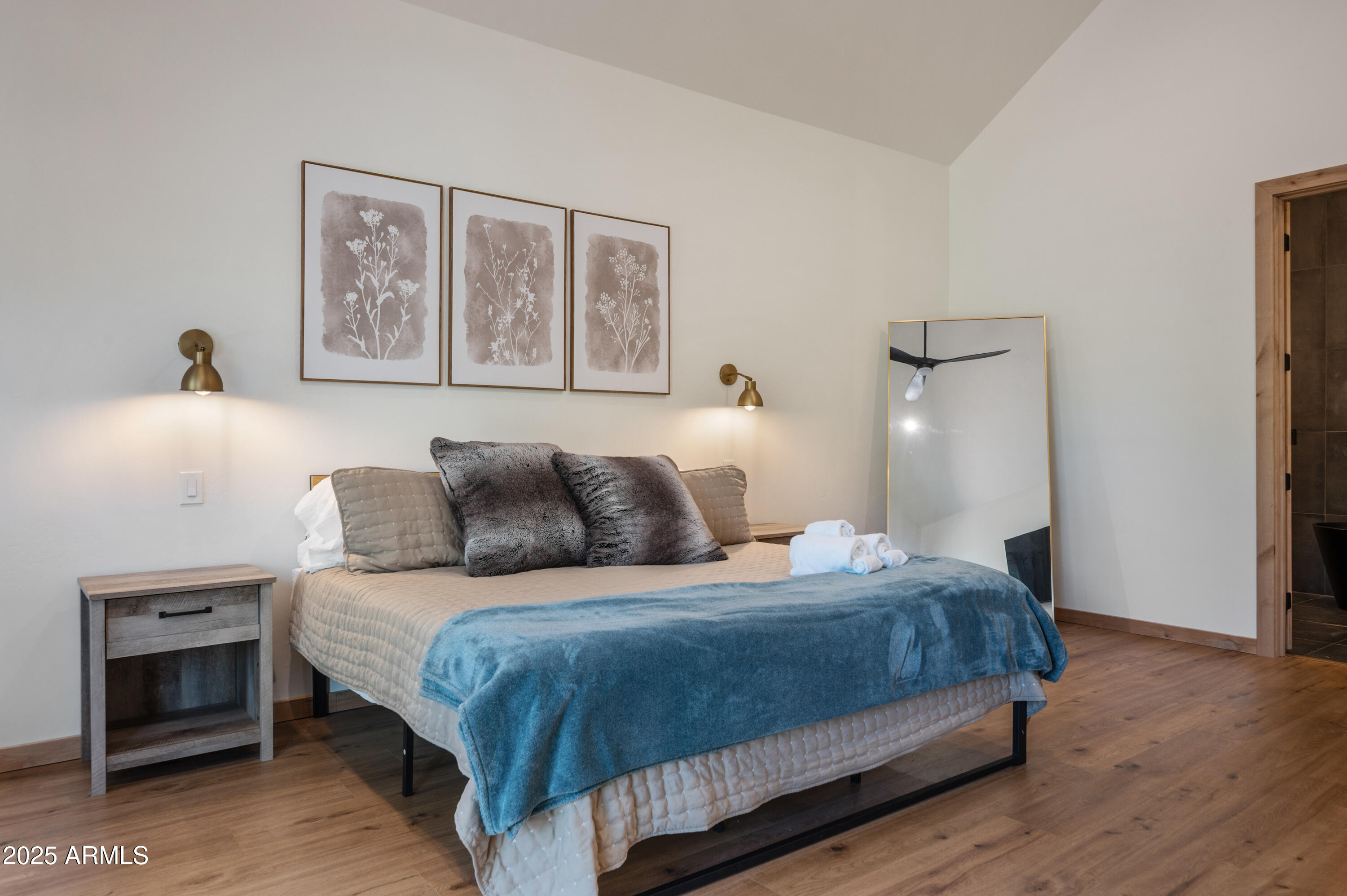 820 West Apache Lane Lakeside, AZ 85929 - Photo 13 of 40 a bedroom with a bed and a night stand