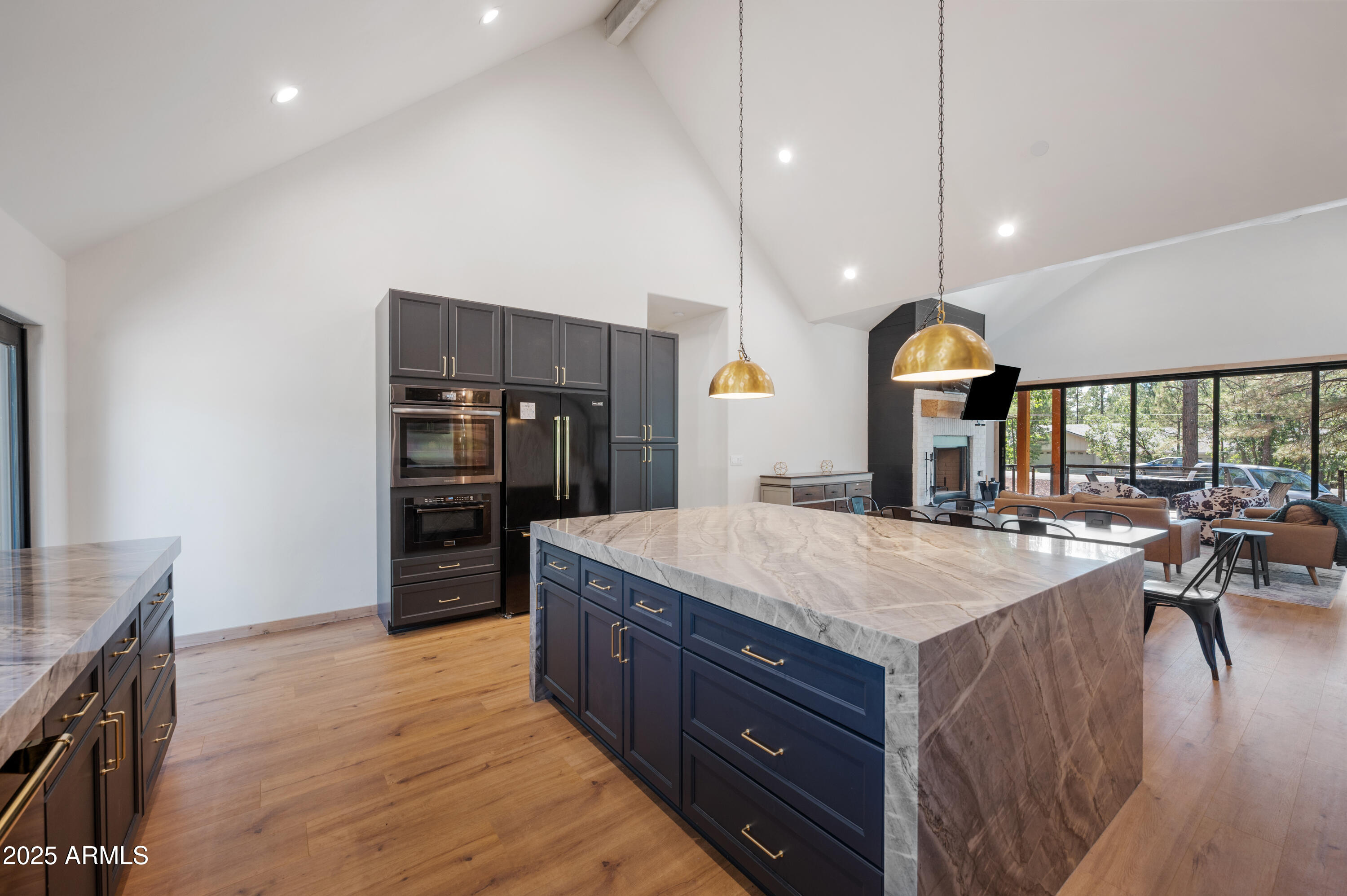 820 West Apache Lane Lakeside, AZ 85929 - Photo 18 of 40 a kitchen with kitchen island a sink appliances and a counter top space