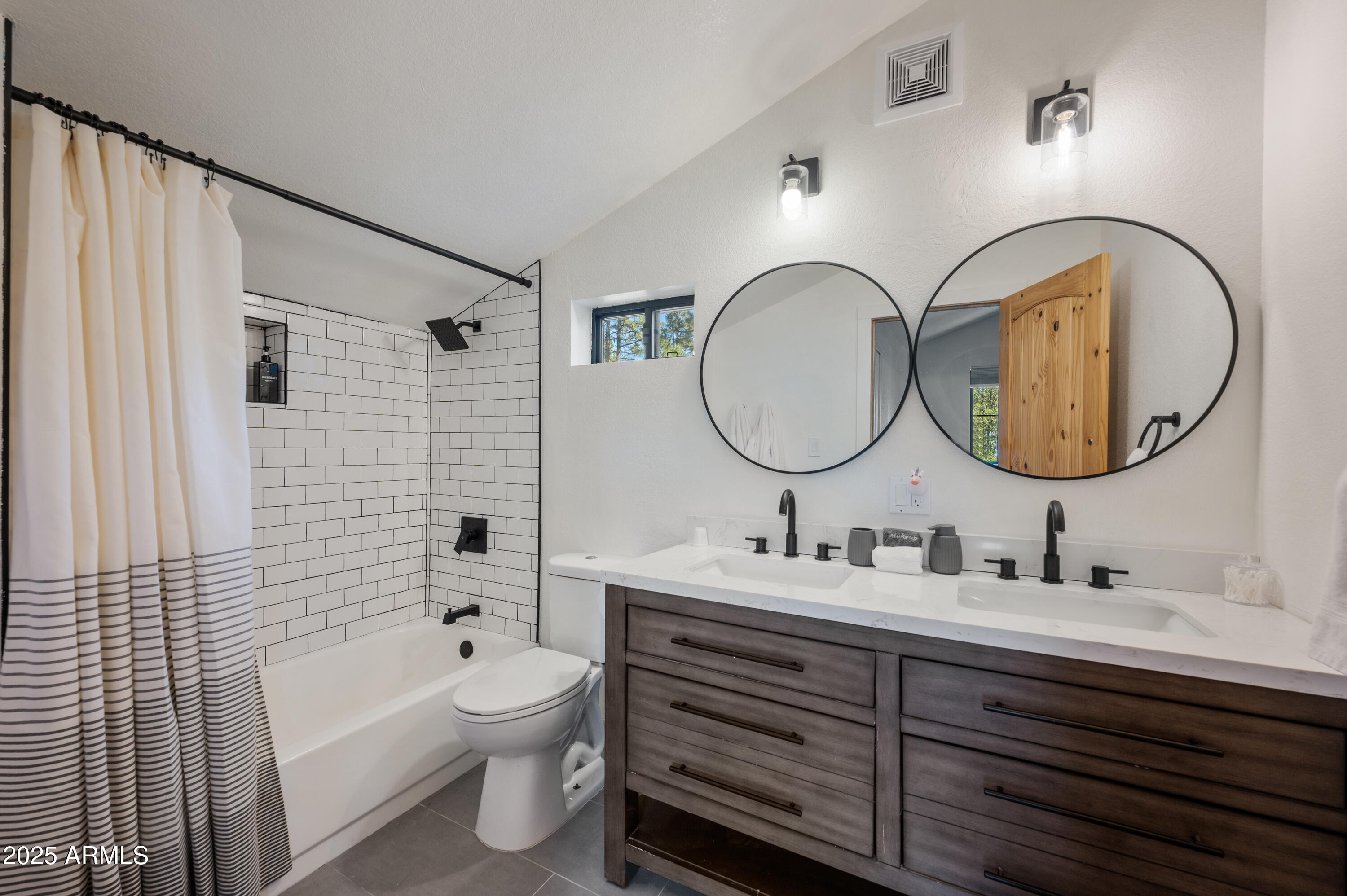 820 West Apache Lane Lakeside, AZ 85929 - Photo 31 of 40 a bathroom with a double vanity sink mirror and toilet