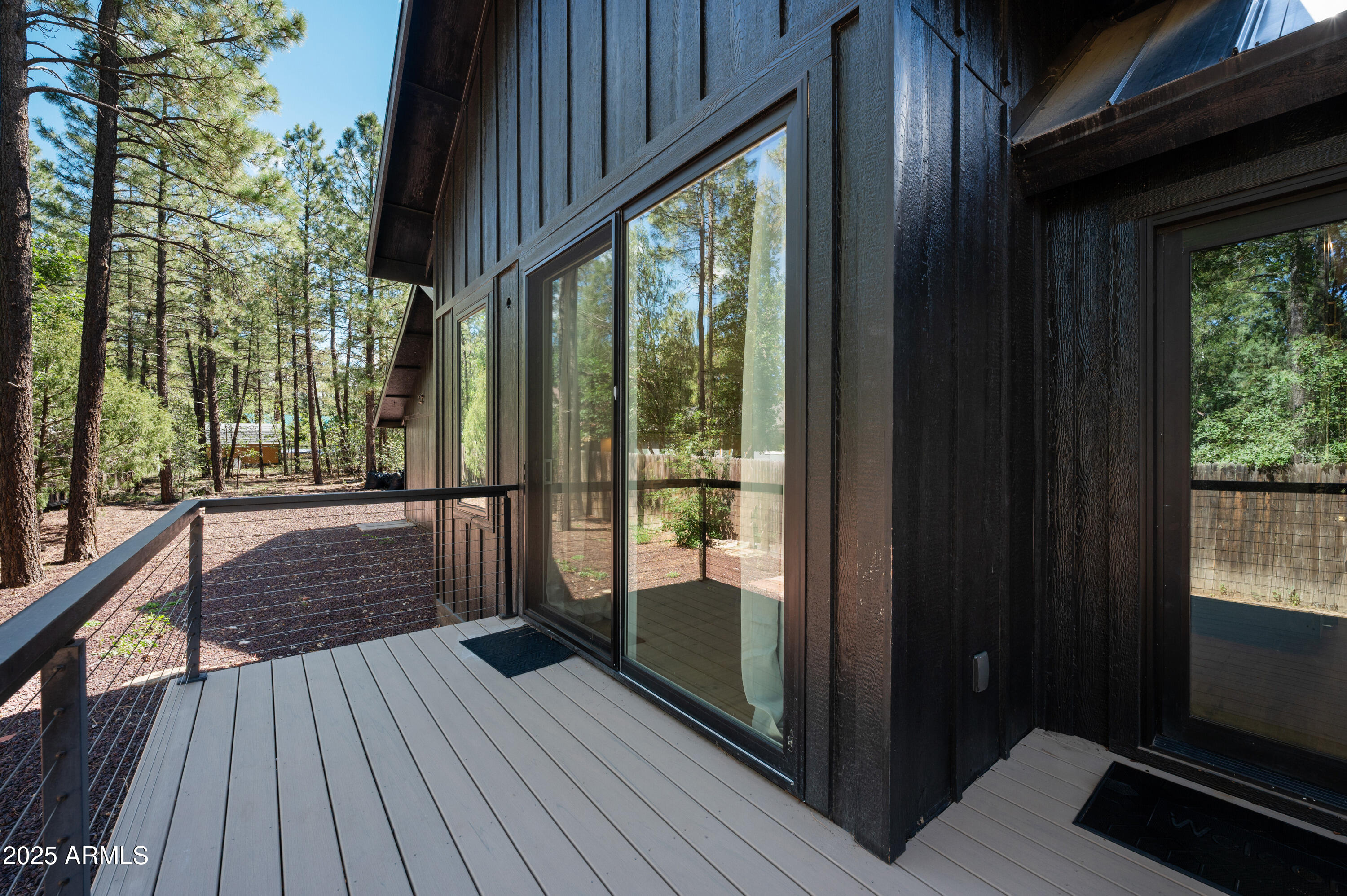 820 West Apache Lane Lakeside, AZ 85929 - Photo 34 of 40 a view of balcony with floor to ceiling window with wooden floor