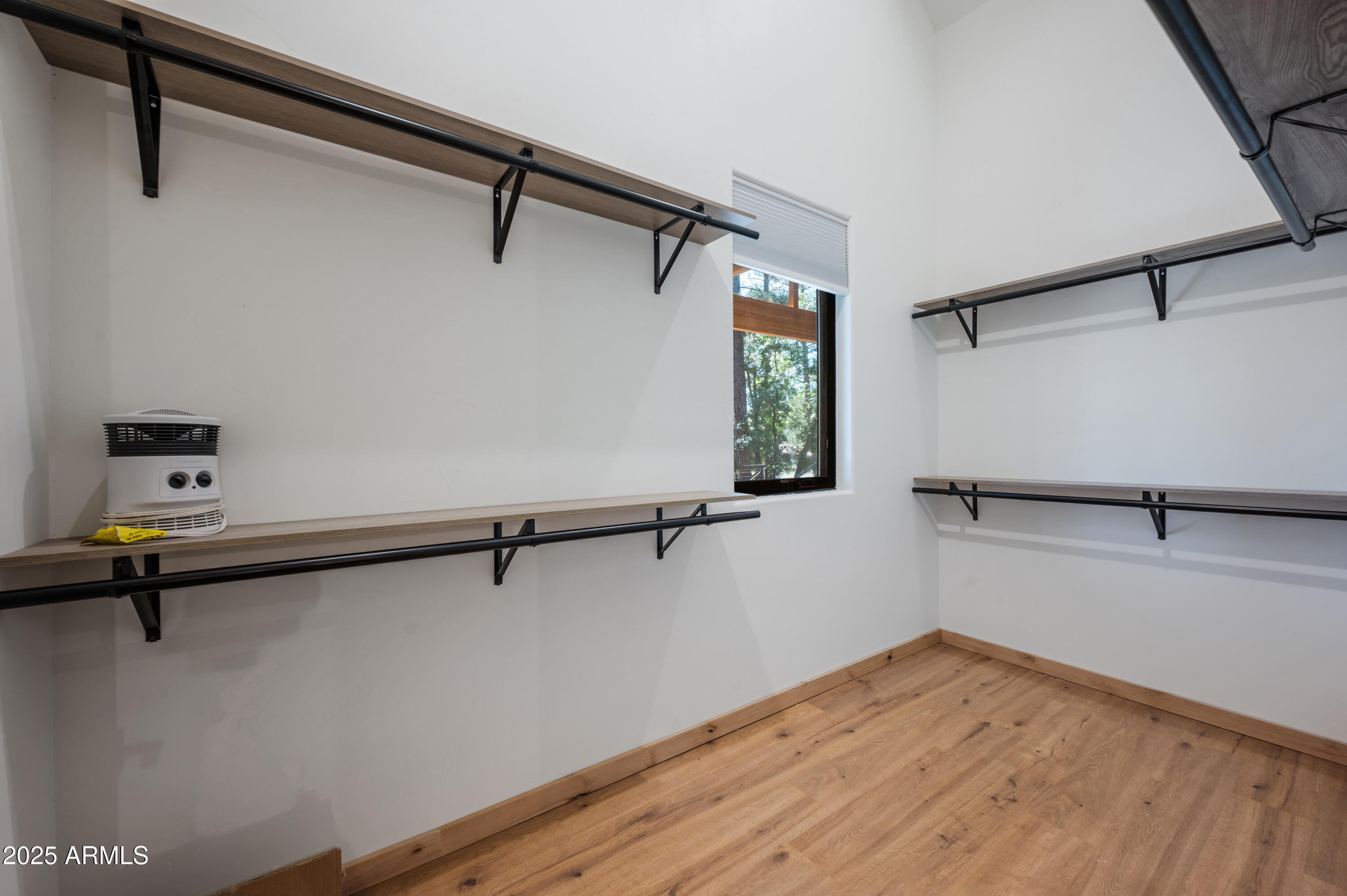 820 West Apache Lane Lakeside, AZ 85929 - Photo 9 of 40 a view of a room with racks on the wall