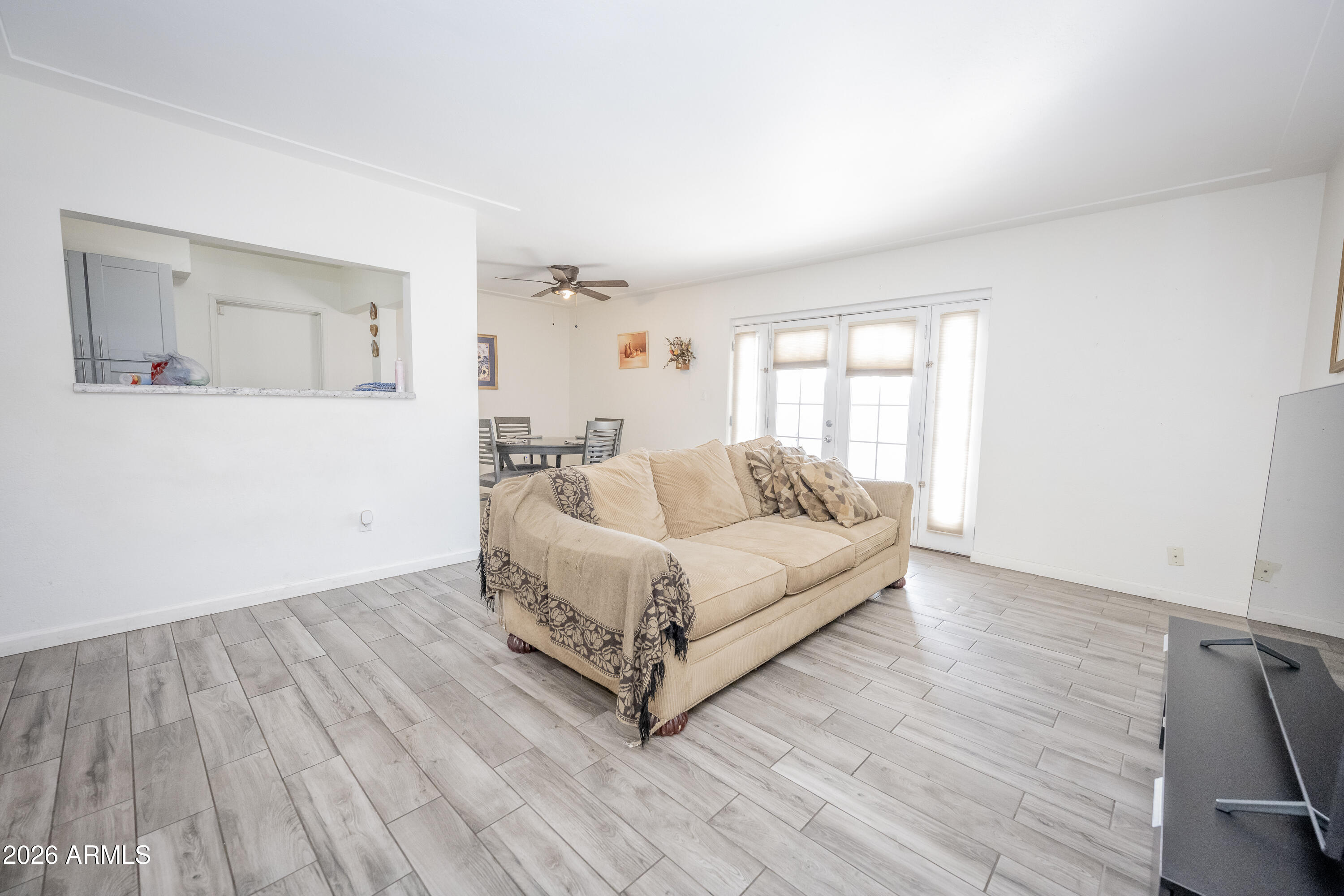 2101 West Glenn Drive Phoenix, AZ 85021 - Photo 2 of 48 a living room with furniture and a hard wood floor