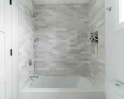 a close view of a bathtub in bathroom