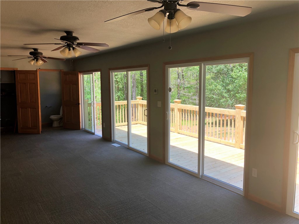 150 Spring Valley Road Salem, SC 29676 - Photo 23 of 48 Sunroom/Den with large sliding glass doors that go