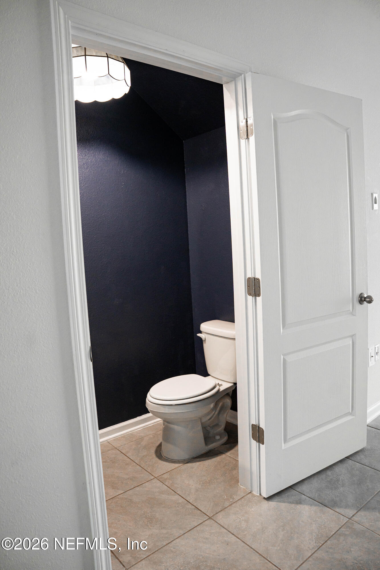 46 Wading Ibis Road St. Augustine, FL 32095 - Photo 12 of 31 a bathroom with a toilet and a shower