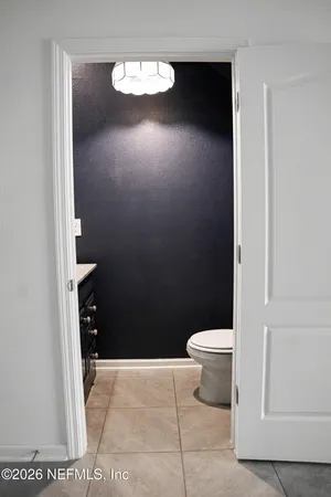 a bathroom with a toilet and a sink
