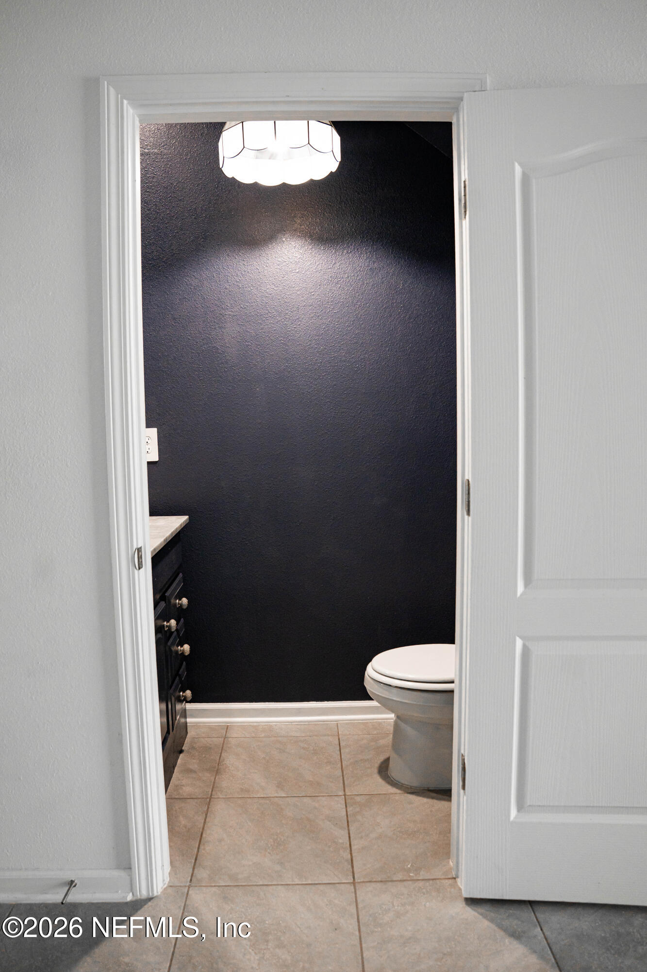 46 Wading Ibis Road St. Augustine, FL 32095 - Photo 14 of 31 a bathroom with a toilet and a sink
