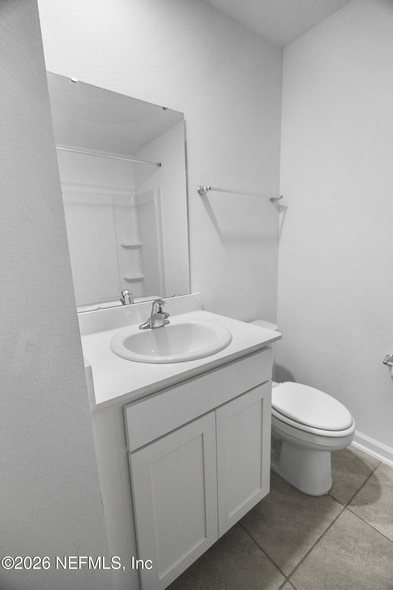 46 Wading Ibis Road St. Augustine, FL 32095 - Photo 25 of 31 a bathroom with a sink toilet and a mirror